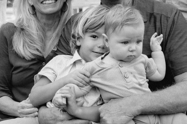 Black and white close-up of grandchildren during a family photo session in Fort Lauderdale