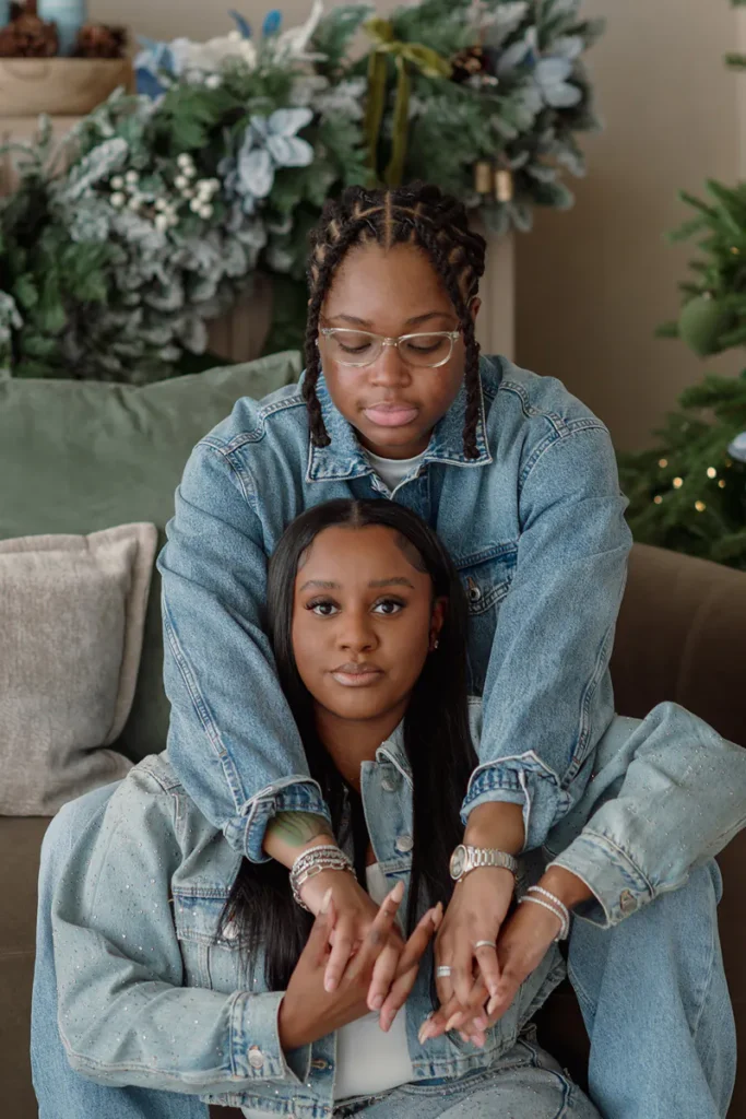 Closeup shot of a couple sitting on a couch for a cozy and intimate holiday session in Miami