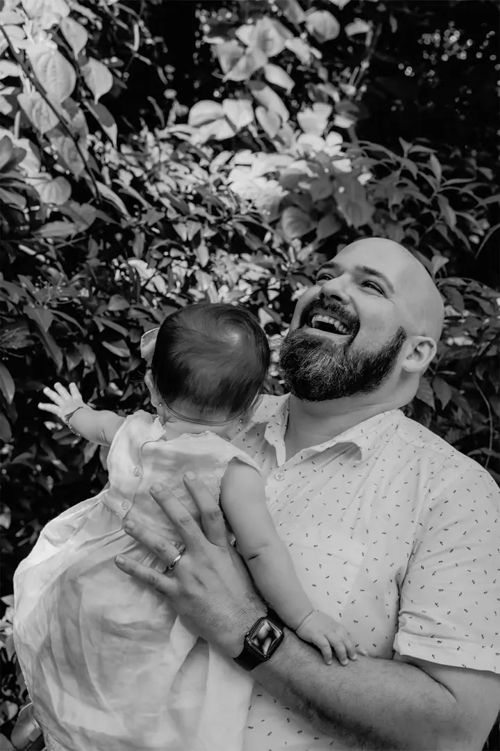 Loving portrait of a baby girl with her dad during their family session