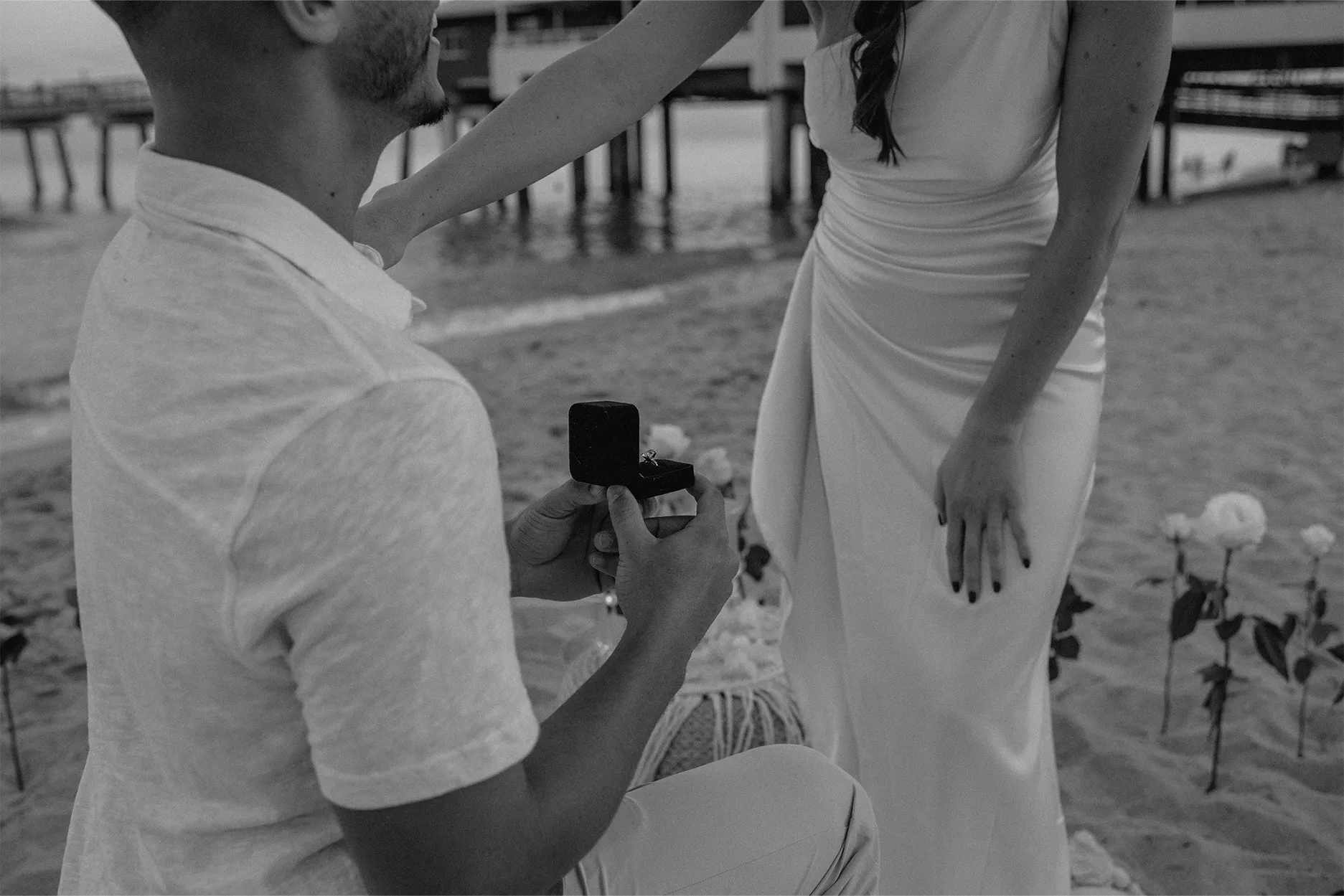 Emotional black and white close-up capturing the raw feelings of the proposal