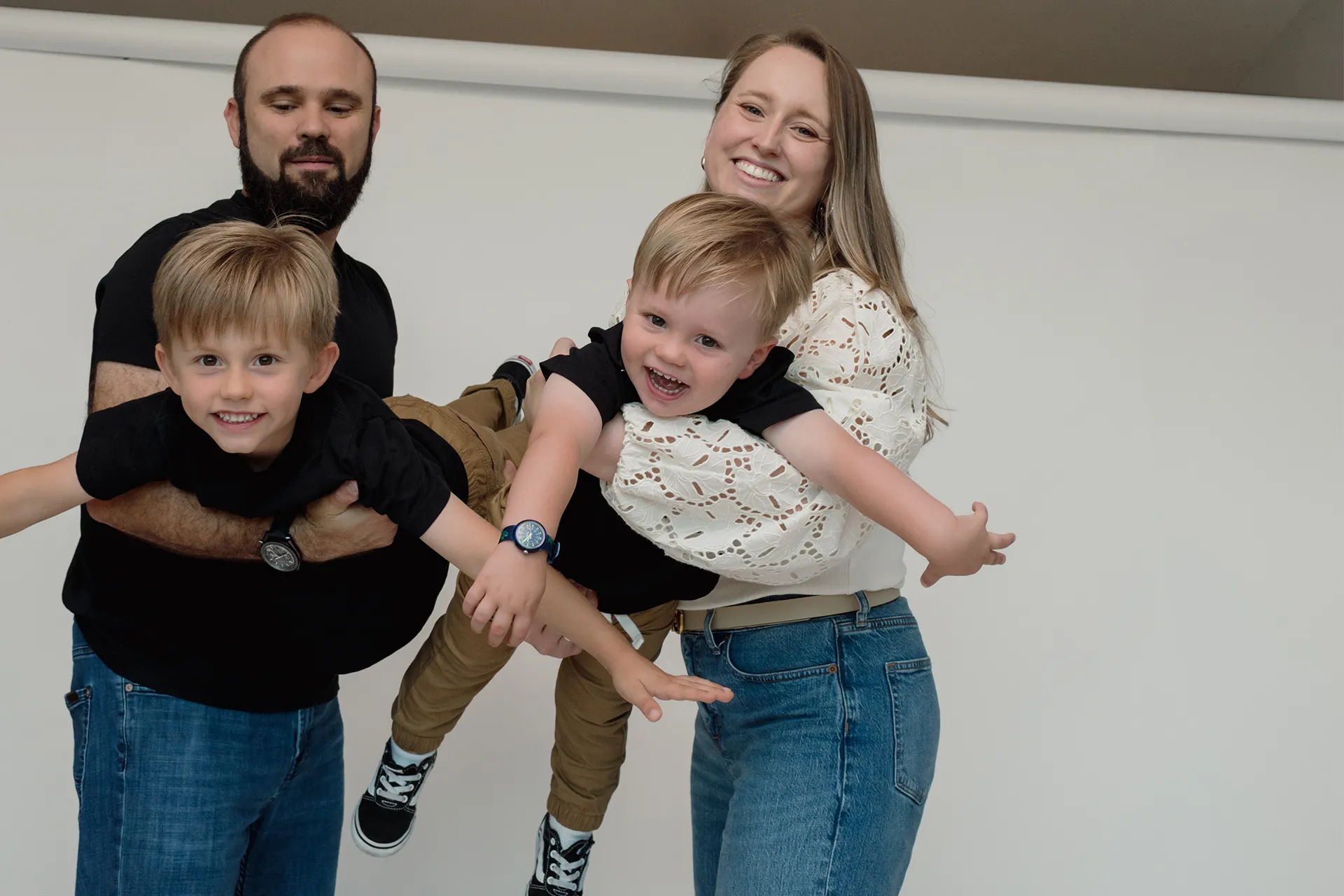Fun family picture capturing genuine joy during a North Miami home shoot.