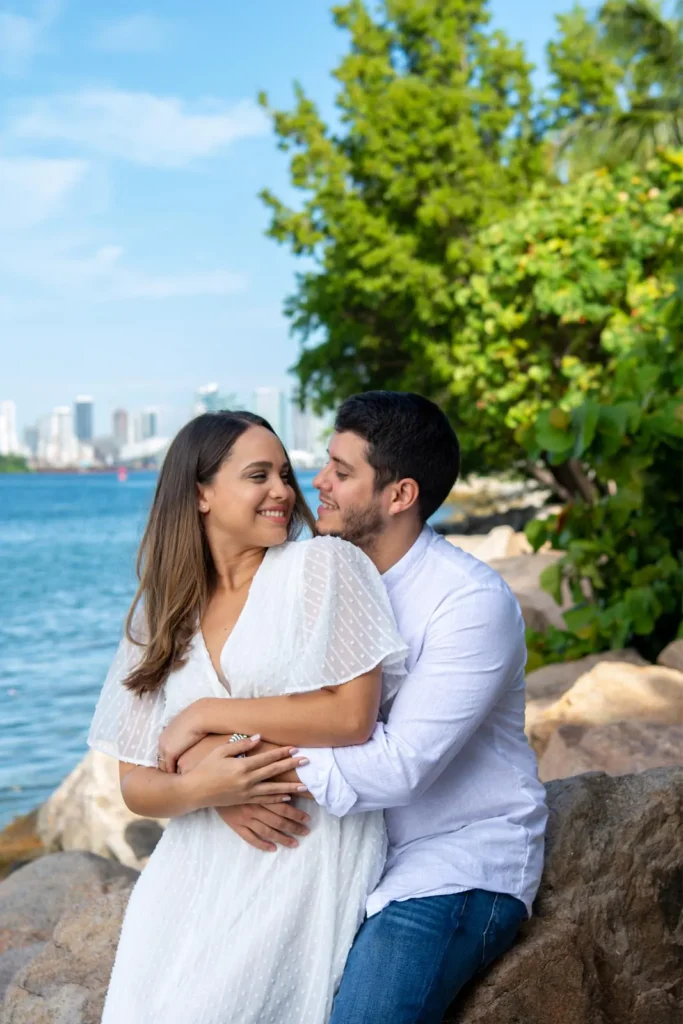 Couples photography capturing laughter and love in a scenic Miami Beach location