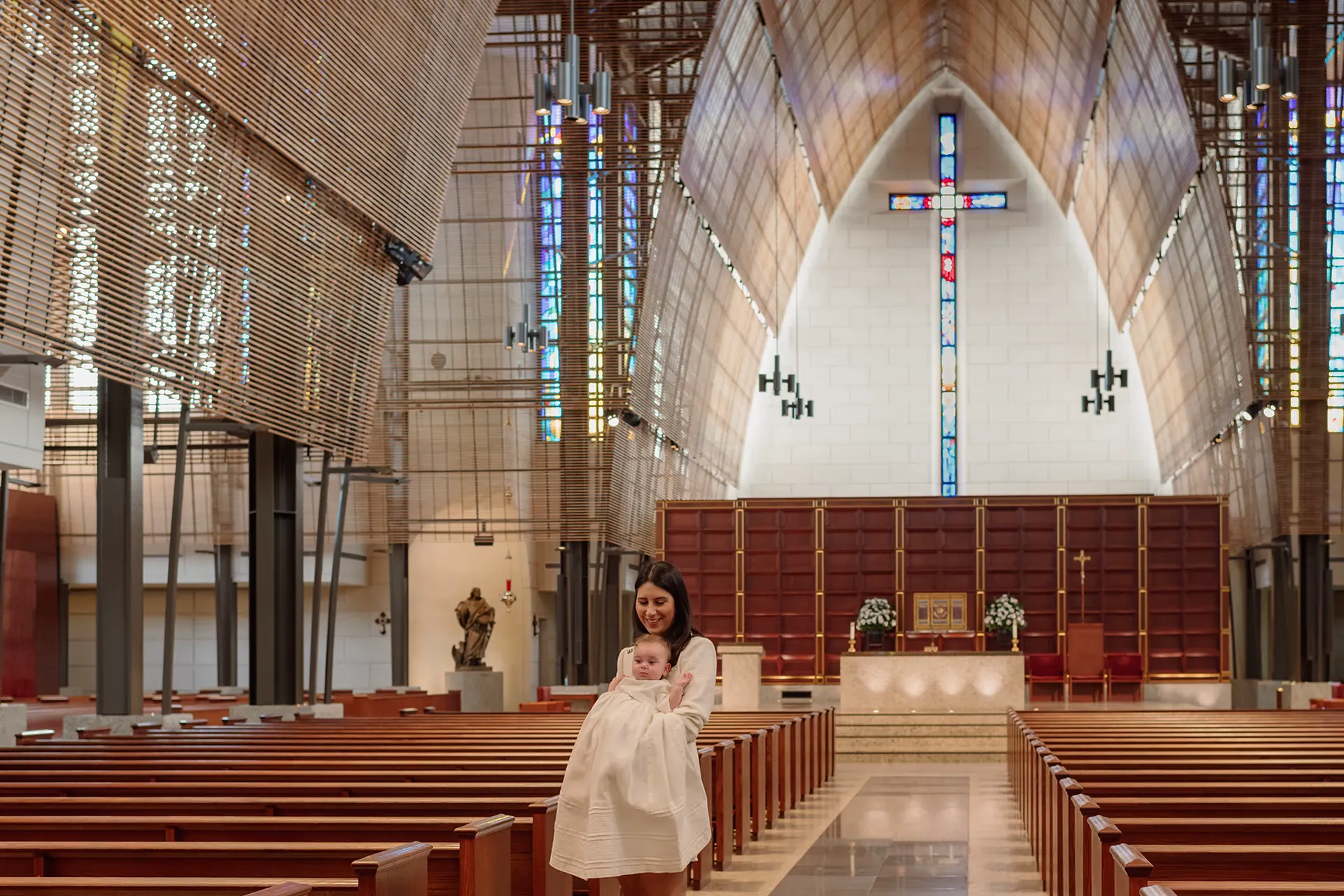 Tender portrait of mother and son before the baptism ceremony