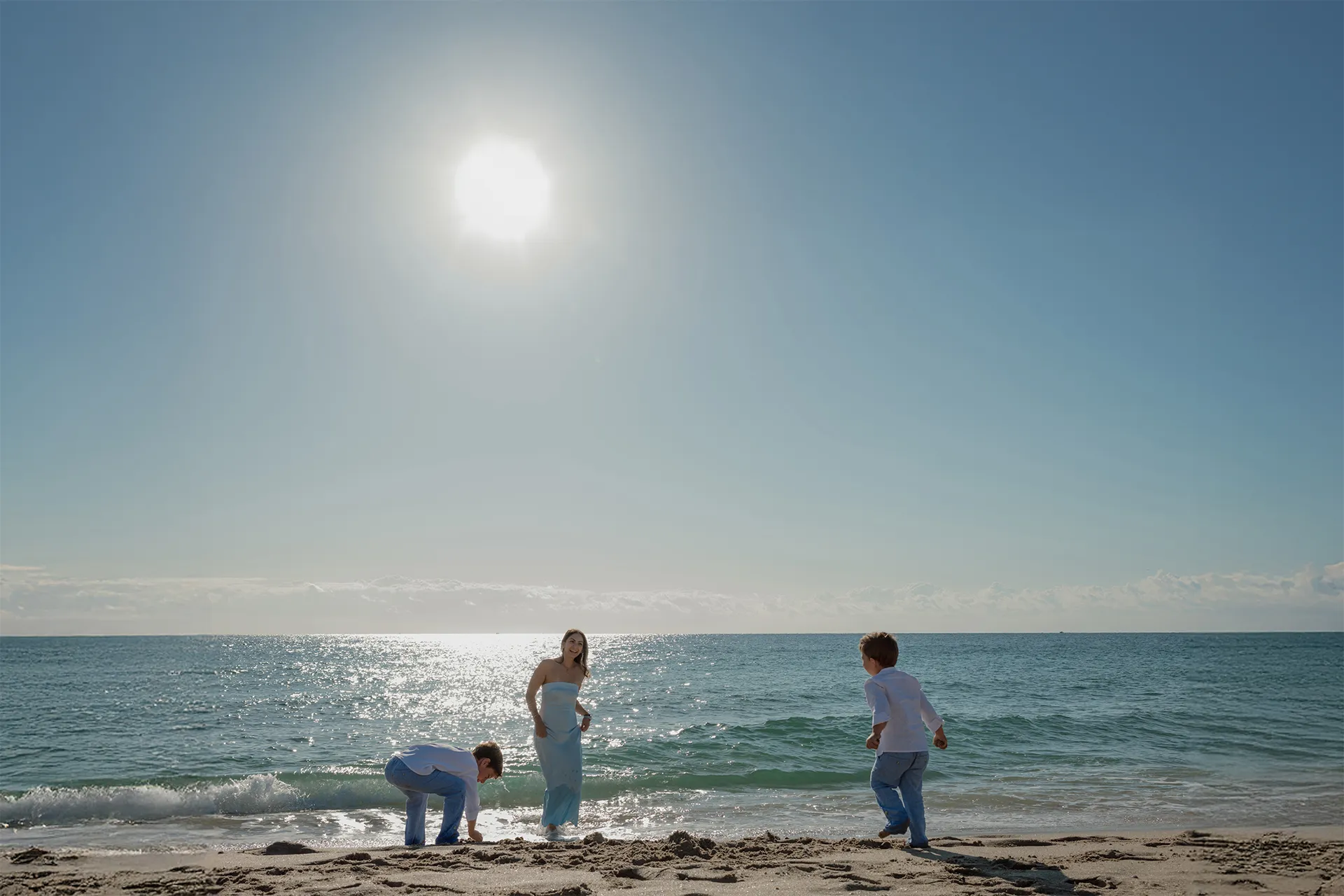 Beautiful sunrise view at Lauderdale-by-the-Sea beach during a family photo session.
