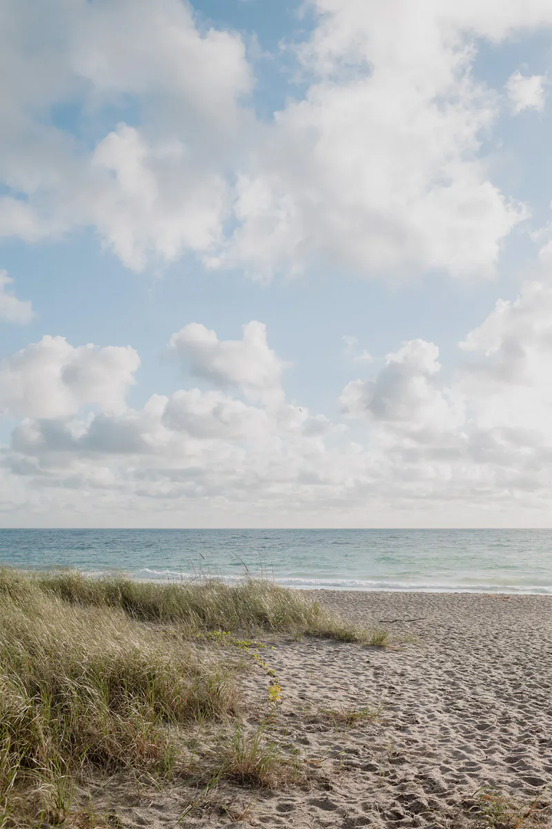 Serene Fort Lauderdale beach at sunrise during a romantic marriage proposal session